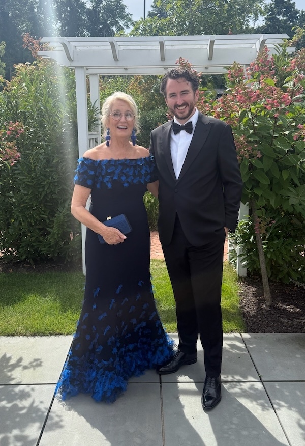 Photo of Ann S. wearing a gown purchased at Vivaldi Boutique